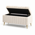 Banc de rangement en tissu beige avec pieds métalliques